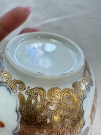 A fine Chinese Canton famille rose gilt-decorated cup and saucer with figural design, Yongzheng/Qianlong