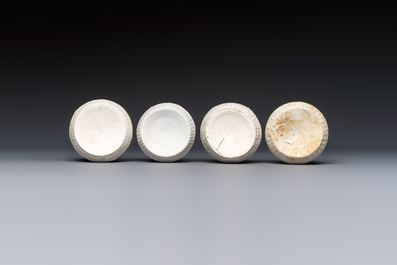 Four Chinese white-glazed boxes and covers with incised floral design from the Jepara shipwreck, Dehua or Anxi kiln, Song