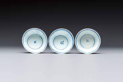 Six Chinese blue and white 'Scholar in a Garden' cups and saucers, Yongzheng