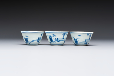 Six Chinese blue and white 'Scholar in a Garden' cups and saucers, Yongzheng