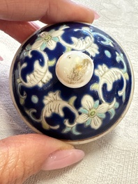 Three Chinese famille rose blue- and yellow-ground teapots and covers for the Straits or Peranakan market, Tongzhi marks, 19th C.