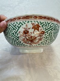 A Chinese famille verte relief-carved bowl with gilt iron-red floral design, Kangxi