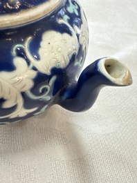 Three Chinese famille rose blue- and yellow-ground teapots and covers for the Straits or Peranakan market, Tongzhi marks, 19th C.
