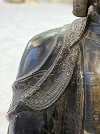 A Chinese bronze seated Buddha, Ming