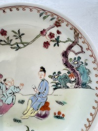Three sets of Chinese famille rose 'Elegant Beauty and Boy' cups and saucers, Qianlong