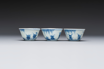 Six Chinese blue and white 'Scholar in a Garden' cups and saucers, Yongzheng