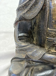 A Chinese bronze seated Buddha, Ming