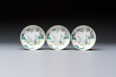 Three sets of Chinese famille rose 'Elegant Beauty and Boy' cups and saucers, Qianlong