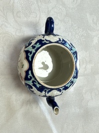 Three Chinese famille rose blue- and yellow-ground teapots and covers for the Straits or Peranakan market, Tongzhi marks, 19th C.