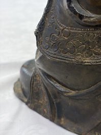 A Chinese bronze seated Buddha, Ming