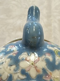 Three Chinese famille rose blue- and yellow-ground teapots and covers for the Straits or Peranakan market, Tongzhi marks, 19th C.