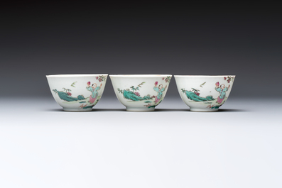 Three sets of Chinese famille rose 'Elegant Beauty and Boy' cups and saucers, Qianlong