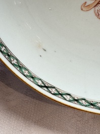 A Chinese famille verte relief-carved bowl with gilt iron-red floral design, Kangxi