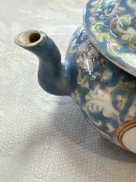 Three Chinese famille rose blue- and yellow-ground teapots and covers for the Straits or Peranakan market, Tongzhi marks, 19th C.