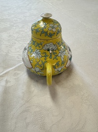 Three Chinese famille rose blue- and yellow-ground teapots and covers for the Straits or Peranakan market, Tongzhi marks, 19th C.