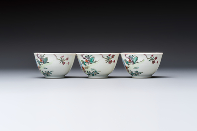 Three sets of Chinese famille rose 'Elegant Beauty and Boy' cups and saucers, Qianlong