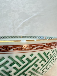 A Chinese famille verte relief-carved bowl with gilt iron-red floral design, Kangxi