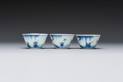 Six Chinese blue and white 'Scholar in a Garden' cups and saucers, Yongzheng