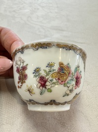 A fine Chinese Canton famille rose gilt-decorated cup and saucer with figural design, Yongzheng/Qianlong