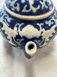 Three Chinese famille rose blue- and yellow-ground teapots and covers for the Straits or Peranakan market, Tongzhi marks, 19th C.