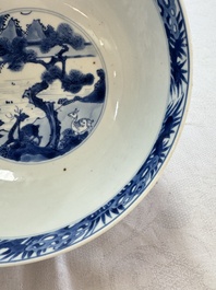 A Chinese blue and white bowl with scholars among cranes and deer, Kangxi mark and of the period