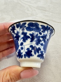 Four Chinese blue and white 'Bleu de Hue' cups and two bowls, various marks, 19th C.