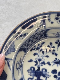Six Chinese blue and white plates, a dish and a large tile, Yongzheng/Qianlong