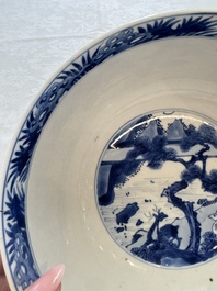 A Chinese blue and white bowl with scholars among cranes and deer, Kangxi mark and of the period