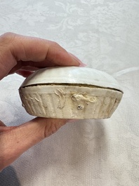 Four Chinese white-glazed boxes and covers with incised floral design from the Jepara shipwreck, Dehua or Anxi kiln, Song