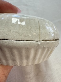 Four Chinese white-glazed boxes and covers with incised floral design from the Jepara shipwreck, Dehua or Anxi kiln, Song