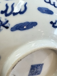 Four Chinese blue and white 'Bleu de Hue' cups and two bowls, various marks, 19th C.