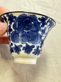 Four Chinese blue and white 'Bleu de Hue' cups and two bowls, various marks, 19th C.