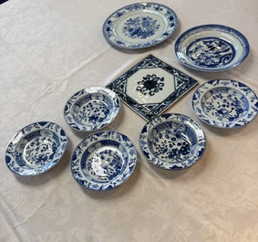 Six Chinese blue and white plates, a dish and a large tile, Yongzheng/Qianlong