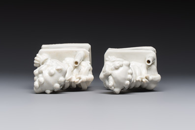 Two Chinese Dehua blanc-de-Chine Buddhist lions, three famille rose figures, and a white-glazed group, Kangxi and later