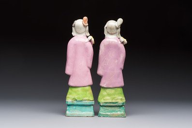 Two Chinese Dehua blanc-de-Chine Buddhist lions, three famille rose figures, and a white-glazed group, Kangxi and later