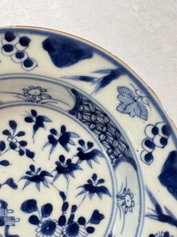 Six Chinese blue and white plates, a dish and a large tile, Yongzheng/Qianlong