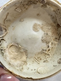 Four Chinese white-glazed boxes and covers with incised floral design from the Jepara shipwreck, Dehua or Anxi kiln, Song