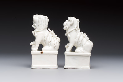 Two Chinese Dehua blanc-de-Chine Buddhist lions, three famille rose figures, and a white-glazed group, Kangxi and later