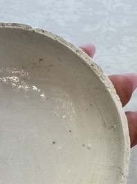 Four Chinese white-glazed boxes and covers with incised floral design from the Jepara shipwreck, Dehua or Anxi kiln, Song