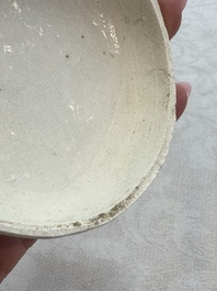 Four Chinese white-glazed boxes and covers with incised floral design from the Jepara shipwreck, Dehua or Anxi kiln, Song