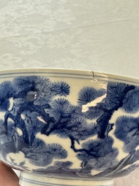 A Chinese blue and white bowl with scholars among cranes and deer, Kangxi mark and of the period