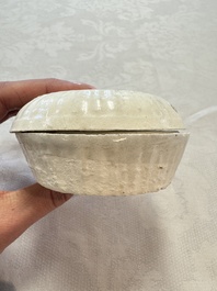 Four Chinese white-glazed boxes and covers with incised floral design from the Jepara shipwreck, Dehua or Anxi kiln, Song