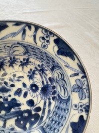 Six Chinese blue and white plates, a dish and a large tile, Yongzheng/Qianlong