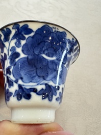 Four Chinese blue and white 'Bleu de Hue' cups and two bowls, various marks, 19th C.