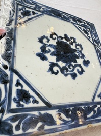 Six Chinese blue and white plates, a dish and a large tile, Yongzheng/Qianlong