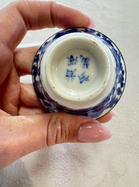 Four Chinese blue and white 'Bleu de Hue' cups and two bowls, various marks, 19th C.