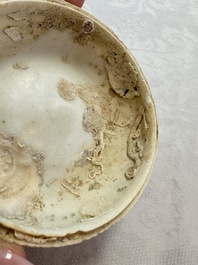 Four Chinese white-glazed boxes and covers with incised floral design from the Jepara shipwreck, Dehua or Anxi kiln, Song