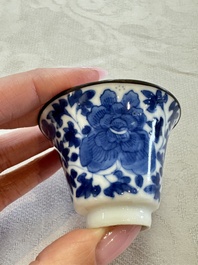 Four Chinese blue and white 'Bleu de Hue' cups and two bowls, various marks, 19th C.