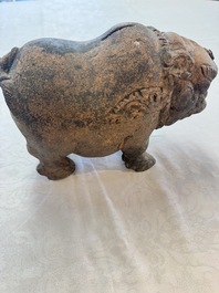 A Javanese terracotta boar-shaped money bank, probably Majapahit Kingdom, 15th C.