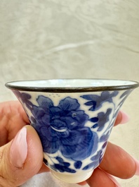Four Chinese blue and white 'Bleu de Hue' cups and two bowls, various marks, 19th C.